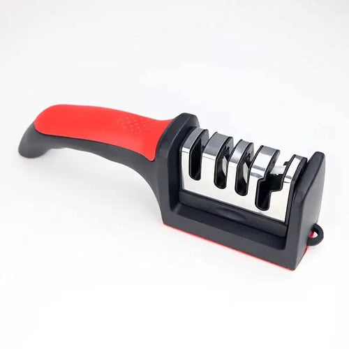 4-stage knife sharpener in use sharpening chef knife kitchen tool