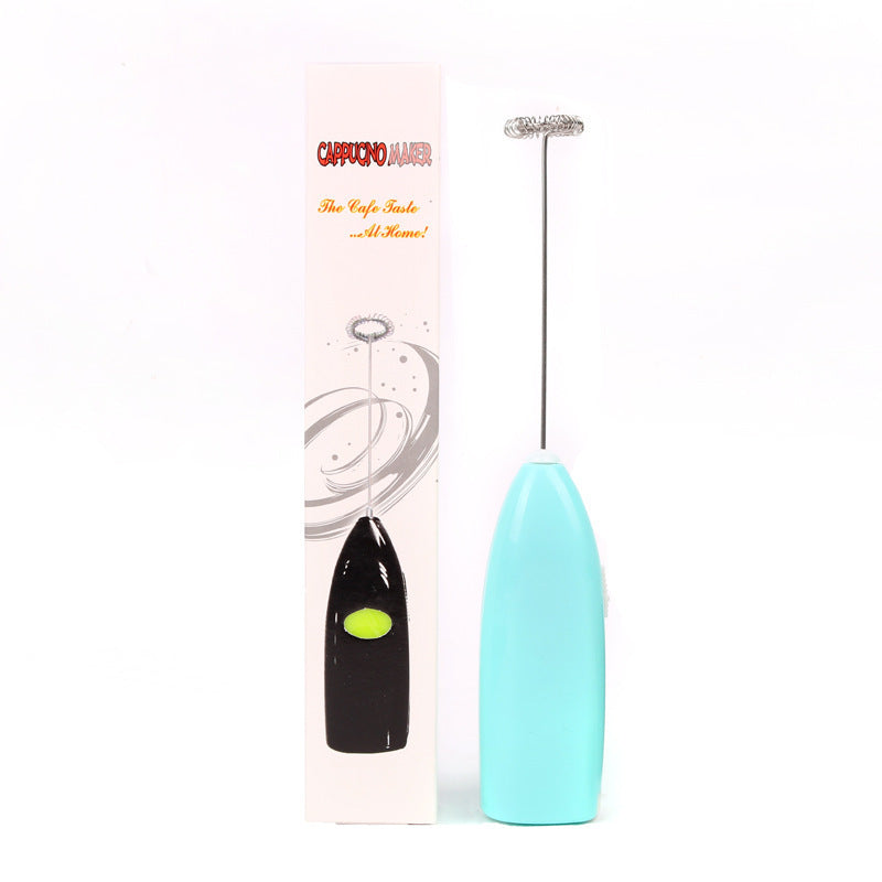 Handheld electric milk frother in green color for coffee and beverages
