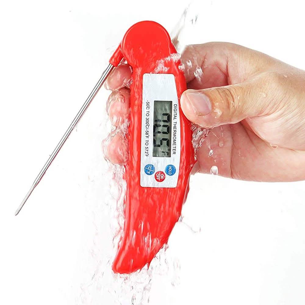 Digital meat thermometer probe measuring food temperature kitchen