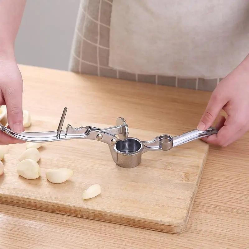 Stainless steel garlic press ergonomic handle kitchen gadget