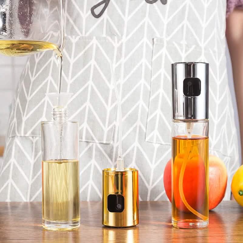 Olive oil mist sprayer bottle close-up nozzle detail kitchen gadget