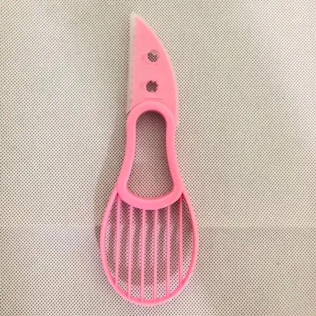 Avocado pitter peeler slicer in kitchen setting product view